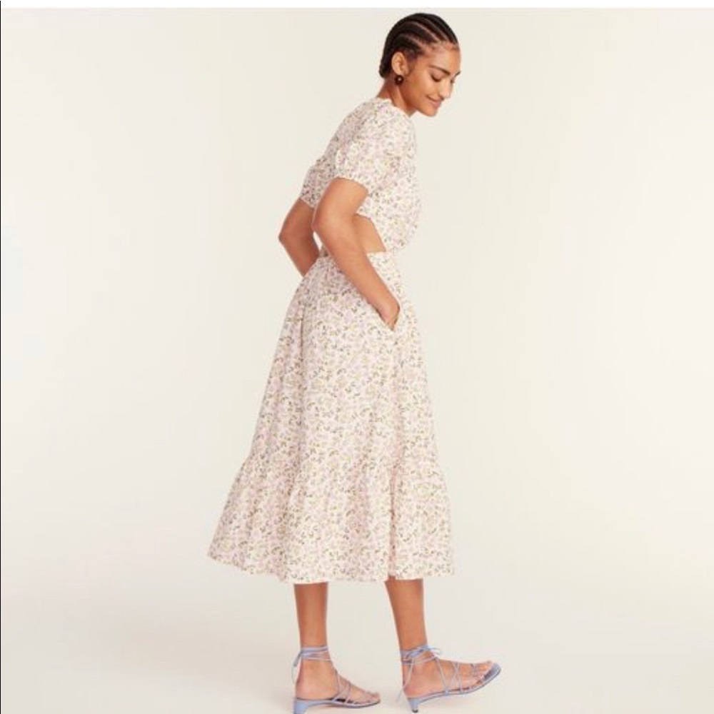 Side cut out floral dress. NWT.